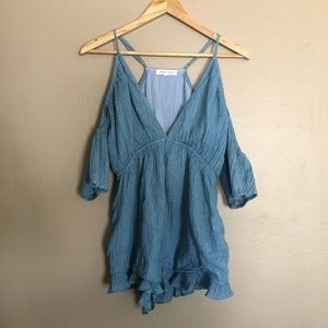 Open shoulder romper.